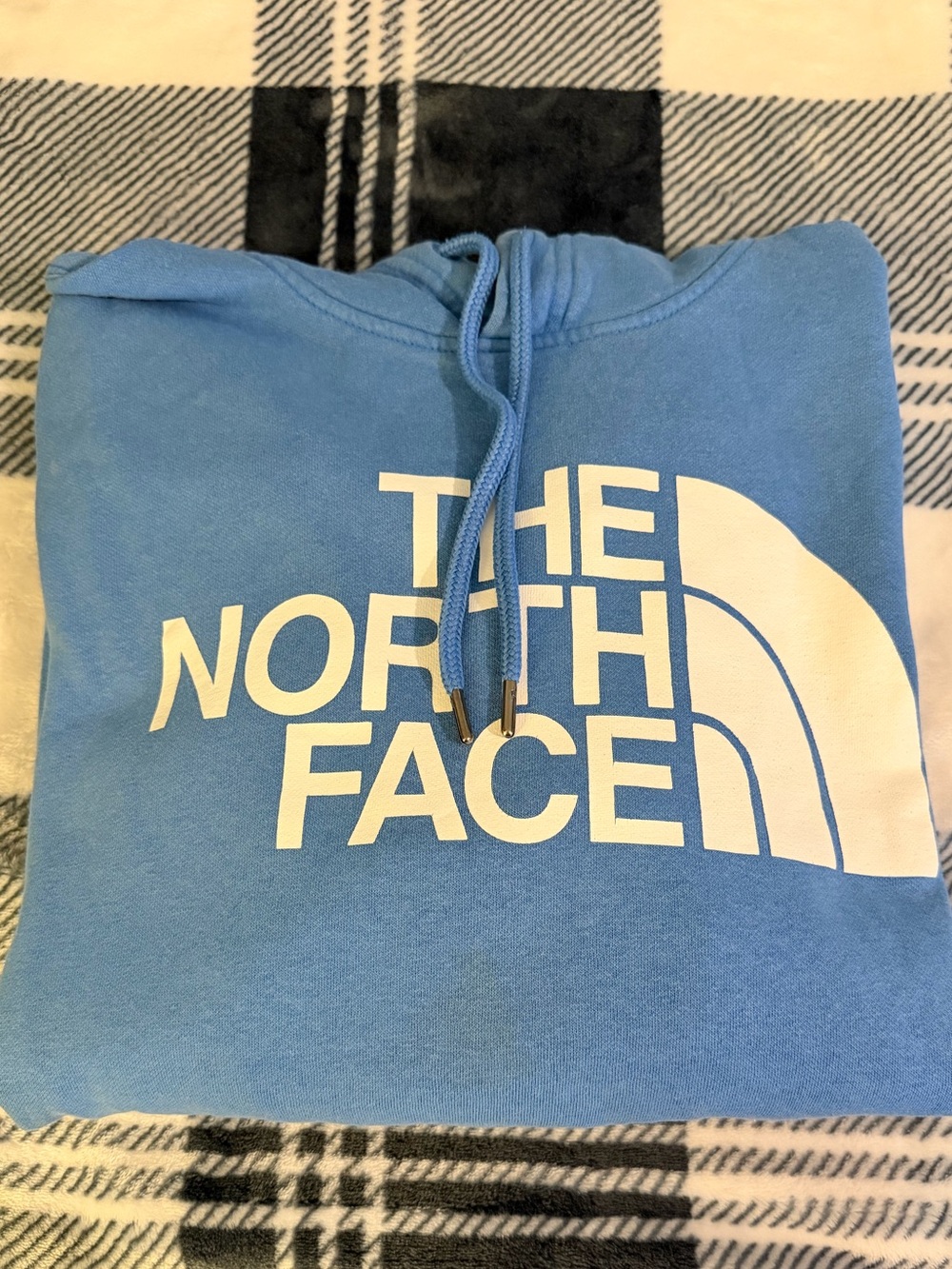 Men’s blue The North Face hoodie